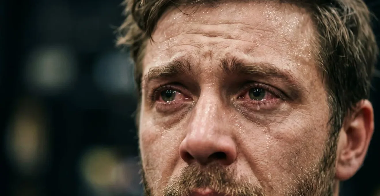 Extreme close-up of an actor's face showing raw emotion during rehearsal
